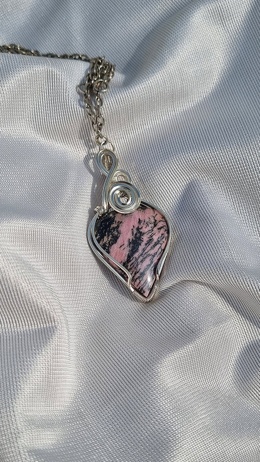 Magic in a stone Rhodonite pendant